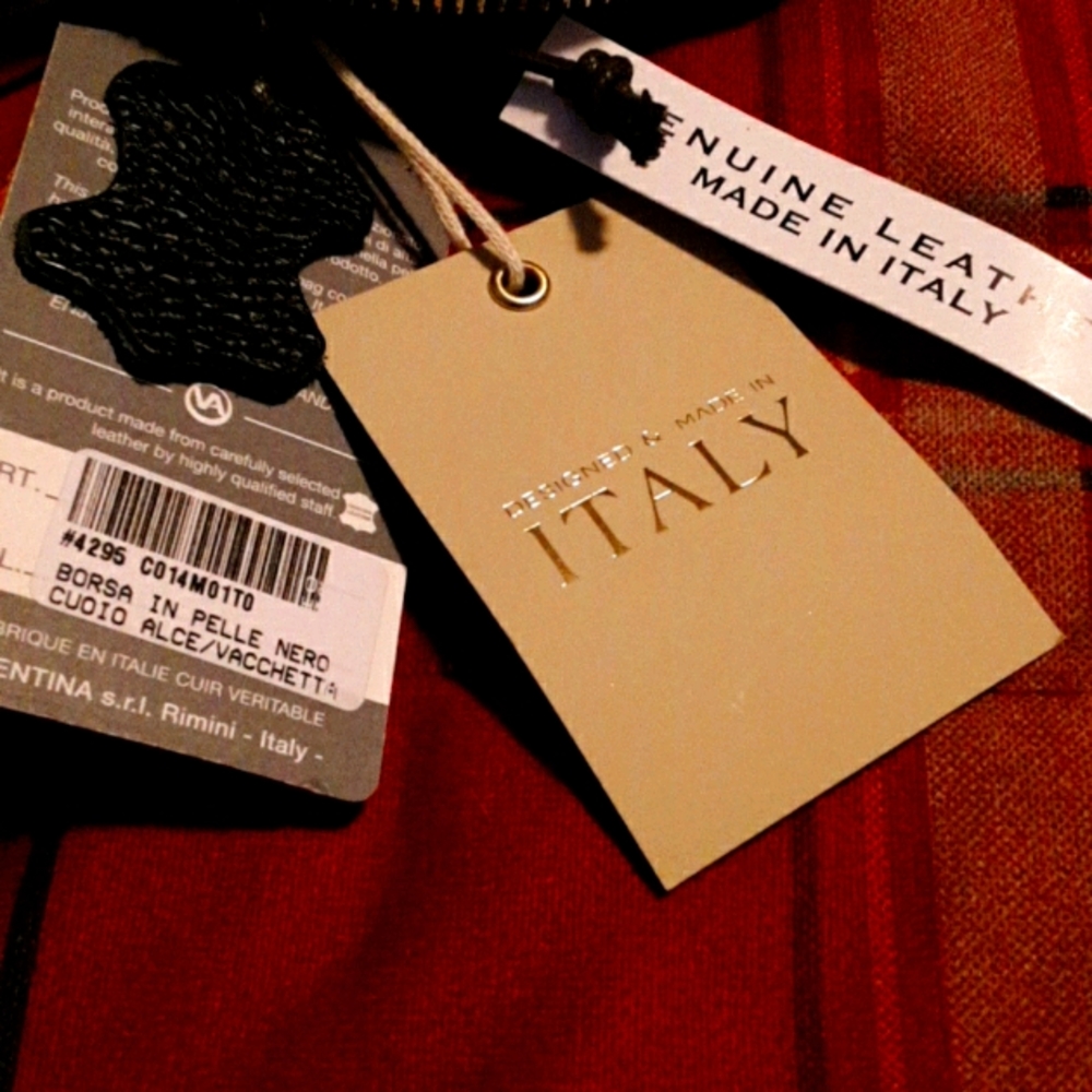 Triple compartment mini leather backpack